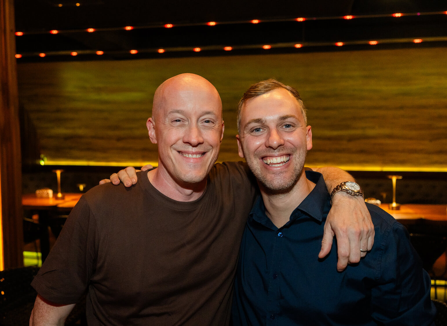 Chris Ducker and WrkPod co-founder celebrating Virtual Staff Finder partnership