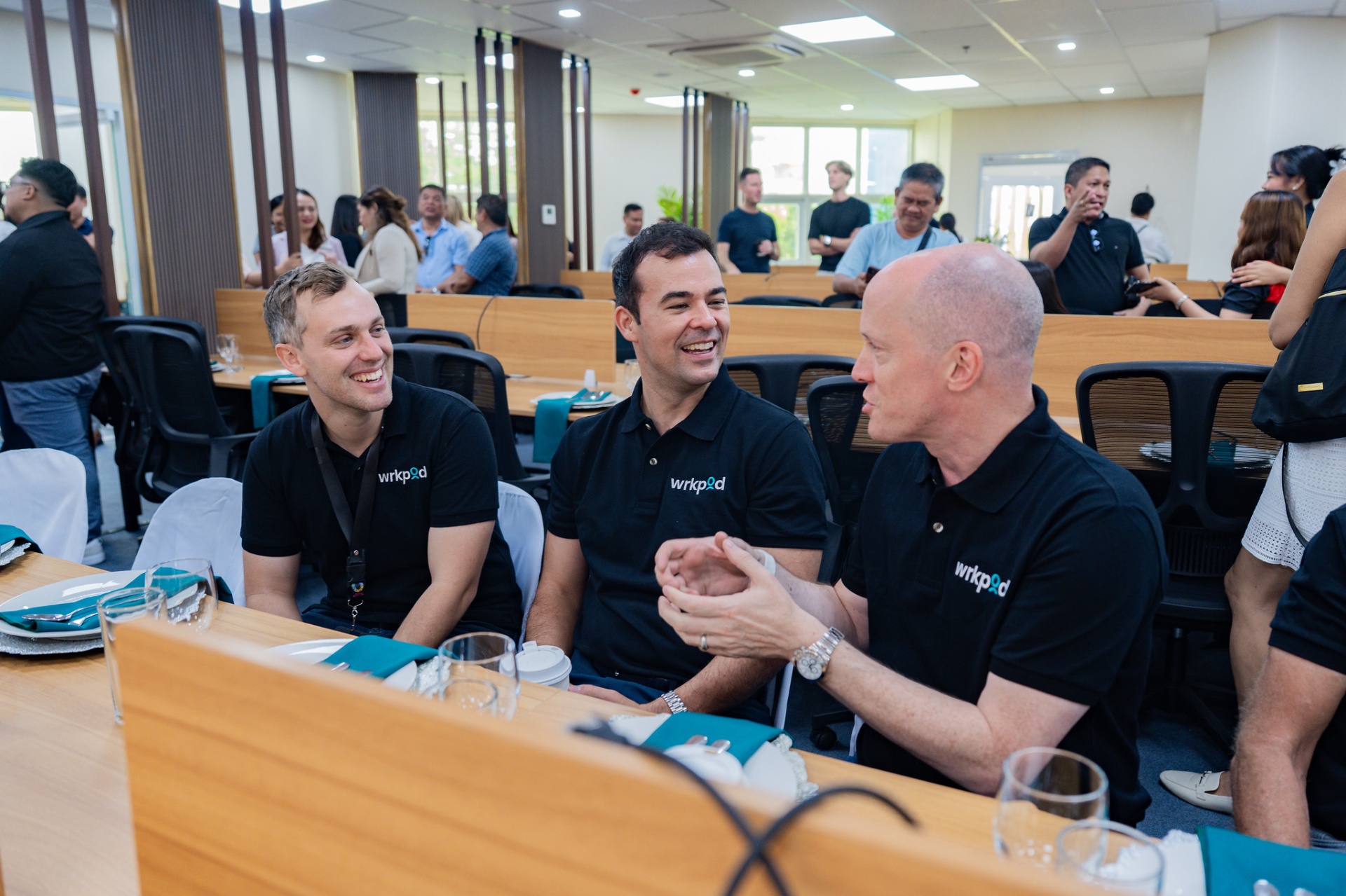 WrkPod leadership team including Chris Ducker at company event, 2024